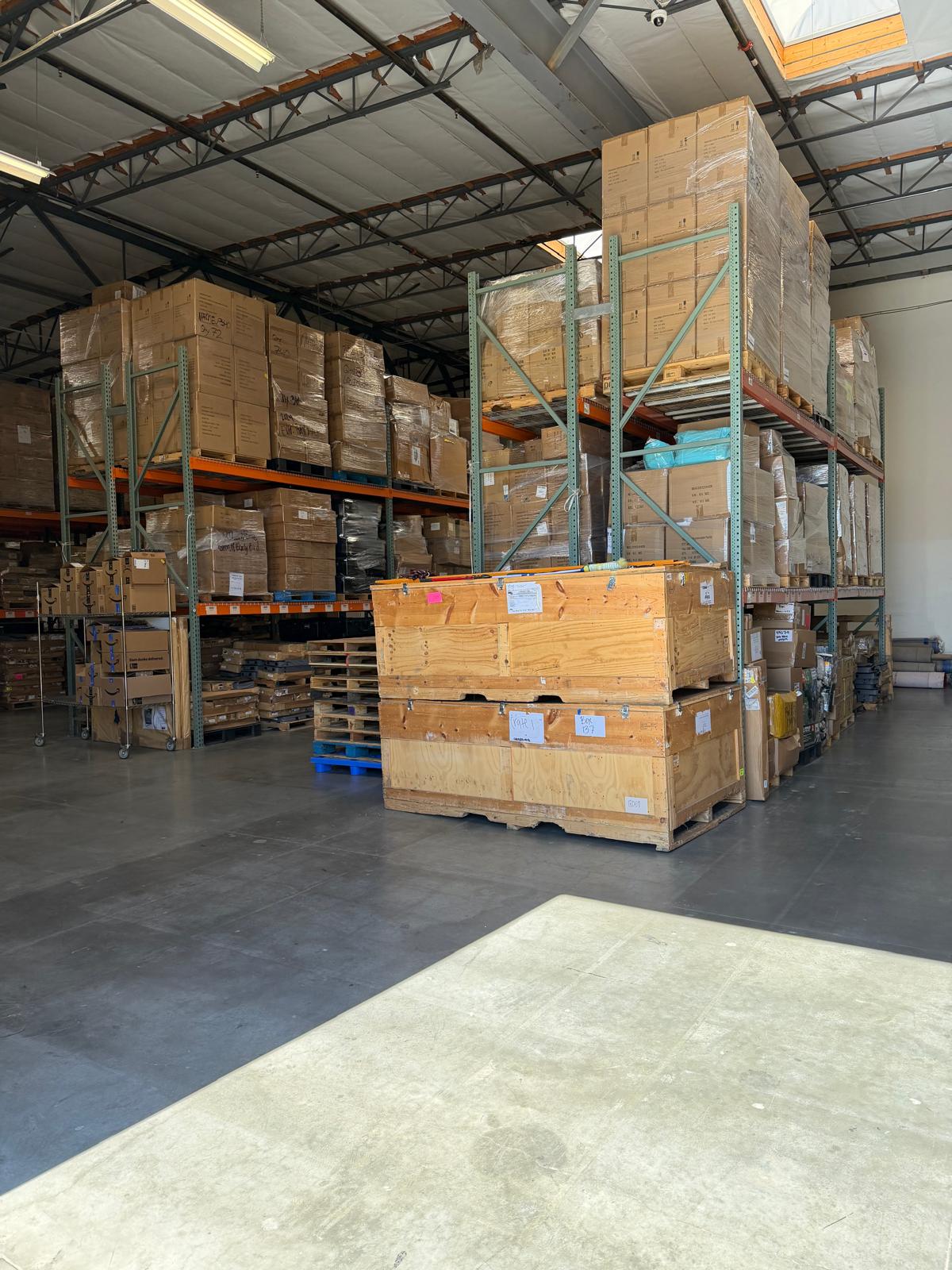 Cura Resource Group warehouse with organized shelves and pallets